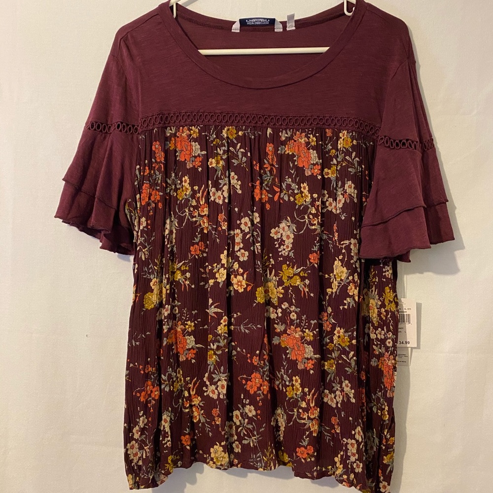 Women’s top size large. NWT. Maroon color.